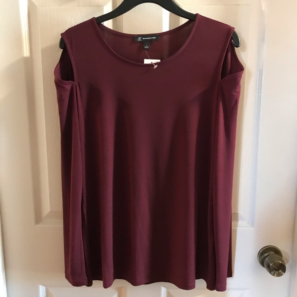 New Top INC